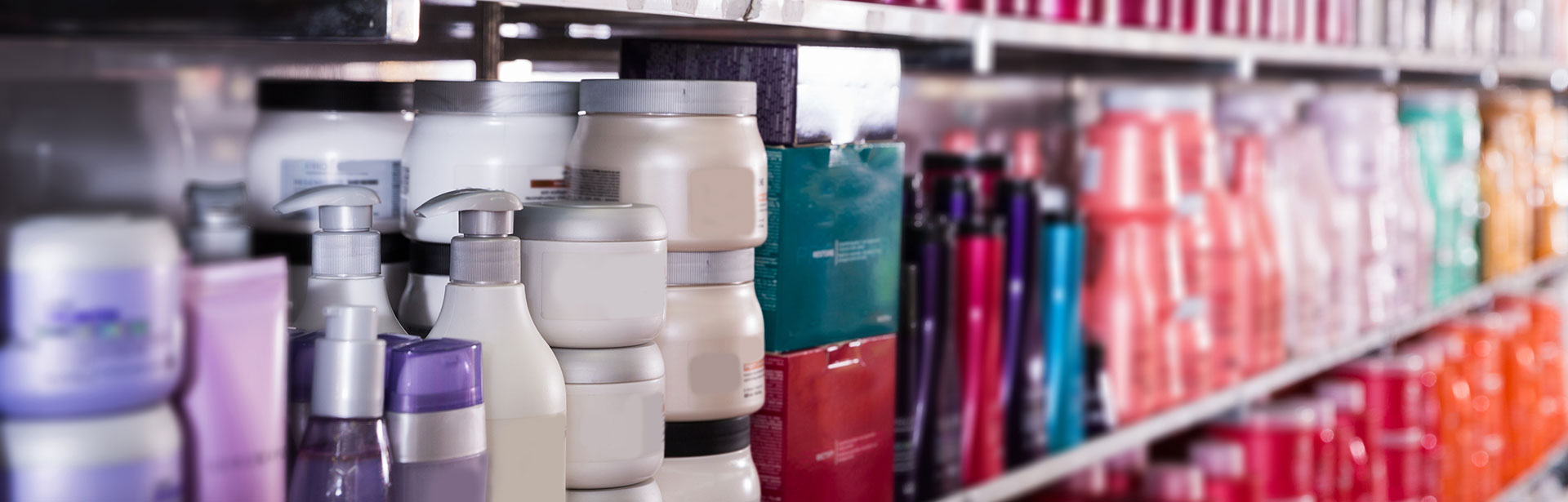 Close-up of a shelf of cosmetic products