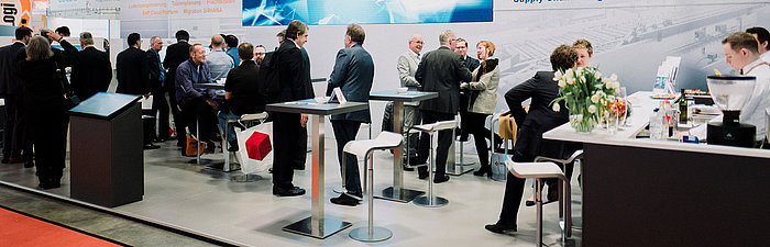 Exhibition booth with consultants and interested parties at LogiMAT