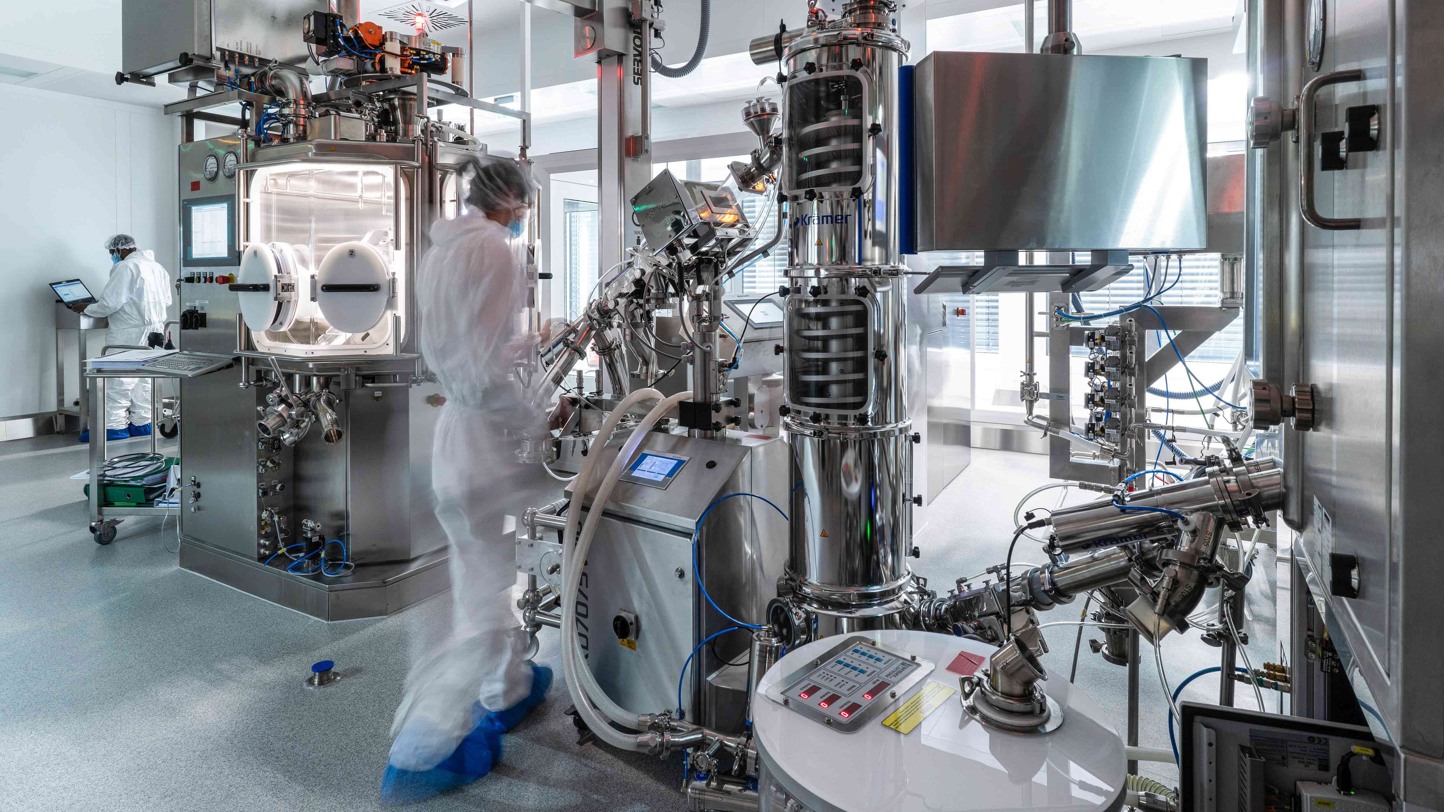 Employee on return tablet press and tablet extractor at Merck