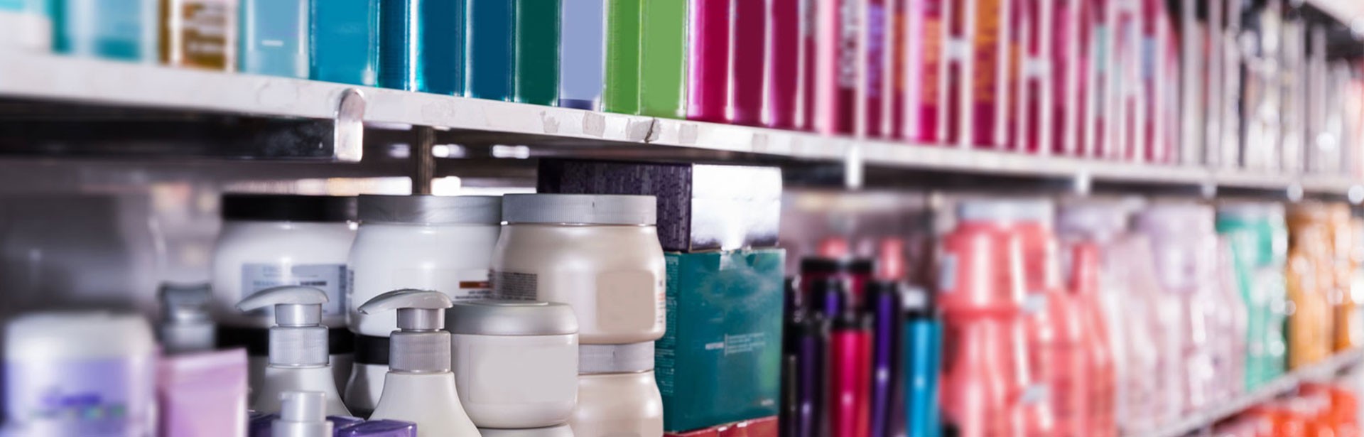 Close-up on a shelf of cosmetic products
